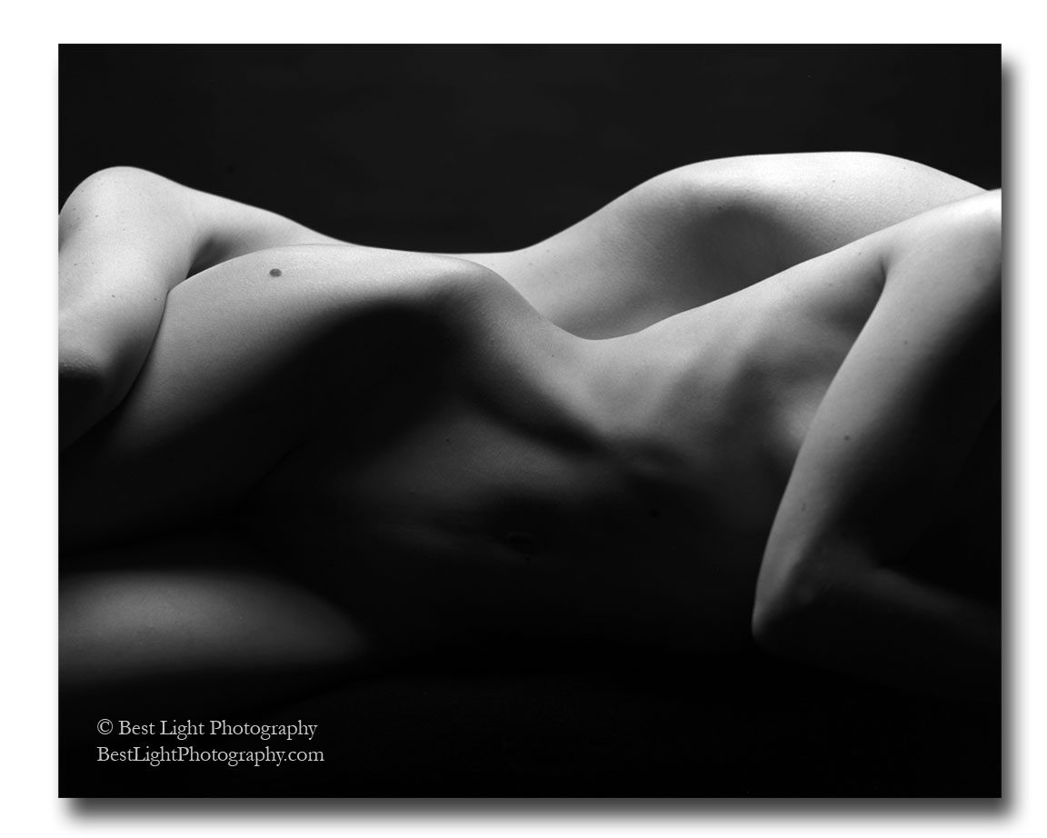 black and white photograph two nude female torsos